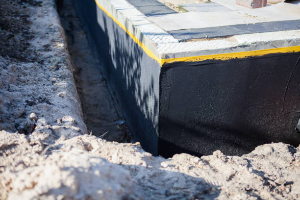 Professional Waterproofing technician working in Dalton, WI